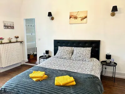 Un ou plusieurs lits dans un hébergement de l'établissement Champagne Therapy Demeure de charme avec piscine et SPA - 7 chambres