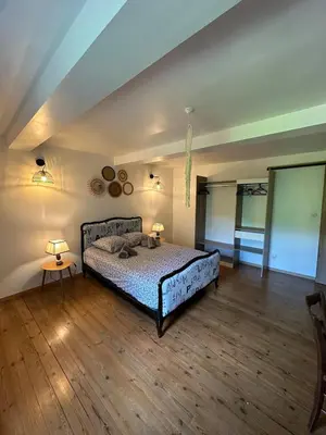 Un ou plusieurs lits dans un hébergement de l'établissement Gîte 3 chambres avec terrasse privée Calme & nature