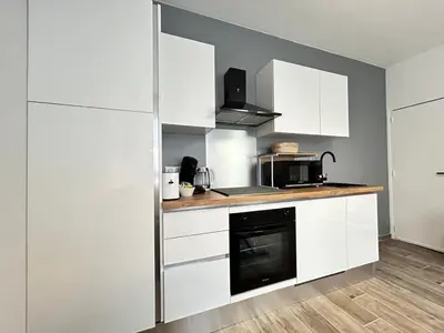 Cuisine ou kitchenette dans l'établissement Chamonix magnifique duplex avec terrasse au centre