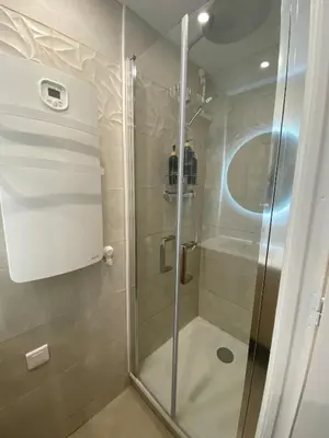 Salle de bains dans l'établissement Le Nid'Ophé Studio Cosy - Proche Disneyland Paris