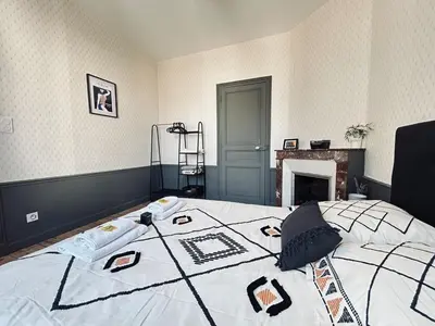 Un ou plusieurs lits dans un hébergement de l'établissement Marzilly maison cosy 3 chbrs avec suite parentale