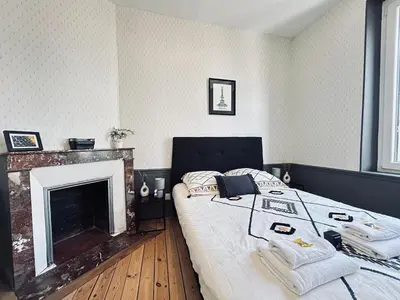 Un ou plusieurs lits dans un hébergement de l'établissement Marzilly maison cosy 3 chbrs avec suite parentale