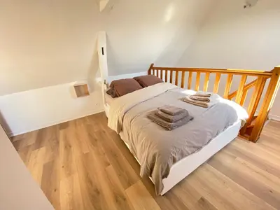 Un ou plusieurs lits dans un hébergement de l'établissement Jolie maison Margnotine avec cour & parking privés