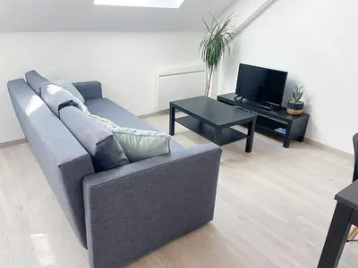 Coin salon dans l'établissement Le Moisson, centre ville, Wifi, Netflix