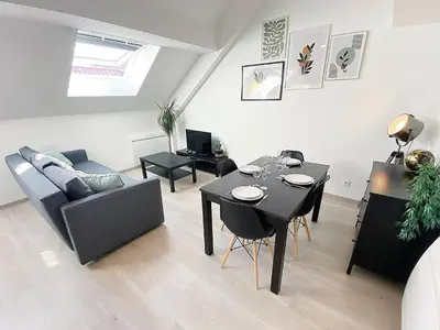 Coin salon dans l'établissement Le Moisson, centre ville, Wifi, Netflix
