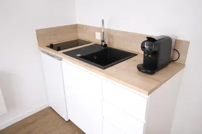 Cuisine ou kitchenette dans l'établissement Studio hyper centre secteur Cathedrale - Forum- Erlon
