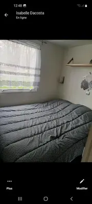 Un ou plusieurs lits dans un hébergement de l'établissement Mobil-home emplacement 1