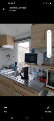 Cuisine ou kitchenette dans l'établissement Mobil-home emplacement 1