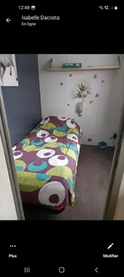 Un ou plusieurs lits dans un hébergement de l'établissement Mobil-home emplacement 1