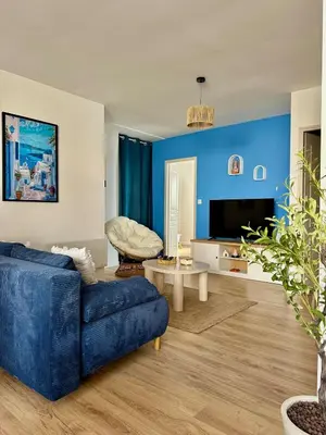 Coin salon dans l'établissement La Grèce - Appartement chaleureux en hypercentre