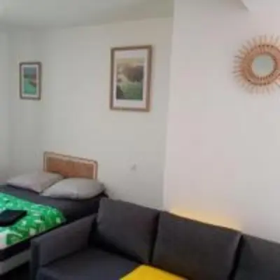 Coin salon dans l'établissement Studio XL & parking gratuit