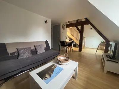 Télévision ou salle de divertissement dans l'établissement L'écrin des remparts