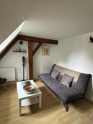 Coin salon dans l'établissement L'écrin des remparts