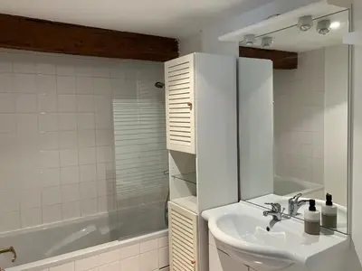 Salle de bains dans l'établissement L'écrin des remparts