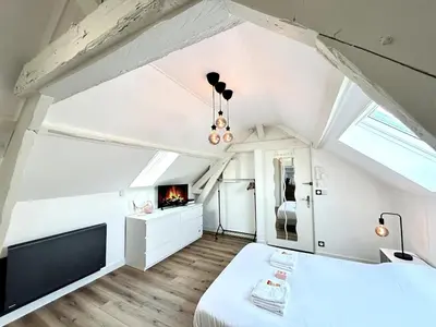 Un ou plusieurs lits dans un hébergement de l'établissement 2 Carteret studio cosy proche centre ville