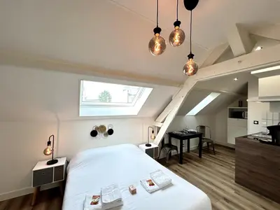Un ou plusieurs lits dans un hébergement de l'établissement 2 Carteret studio cosy proche centre ville