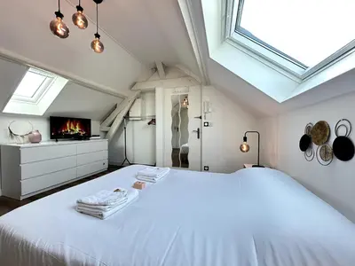 Un ou plusieurs lits dans un hébergement de l'établissement 2 Carteret studio cosy proche centre ville
