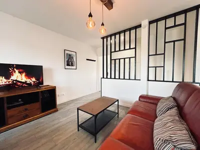 Coin salon dans l'établissement Neufchâtel T3 cocooning tout équipé proche centre