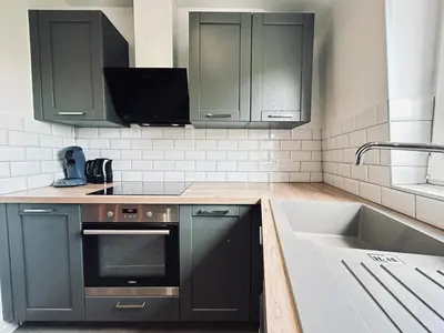 Cuisine ou kitchenette dans l'établissement Neufchâtel T3 cocooning tout équipé proche centre