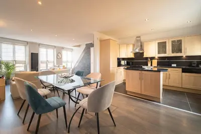 Cuisine ou kitchenette dans l'établissement Duplex avec parking La Parenthèse Pétillante