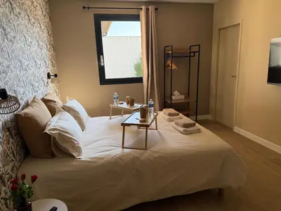 Un ou plusieurs lits dans un hébergement de l'établissement Suite du Spa 1 - Parking Privé Gratuit