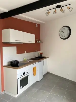 Cuisine ou kitchenette dans l'établissement Autour de la bulle