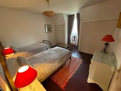 Un ou plusieurs lits dans un hébergement de l'établissement L'Auberge du Château