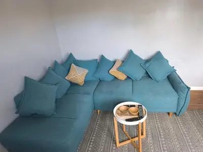Coin salon dans l'établissement Appartement confortable à Eppeville de 70 m²