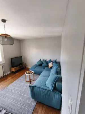 Coin salon dans l'établissement Appartement confortable à Eppeville de 70 m²