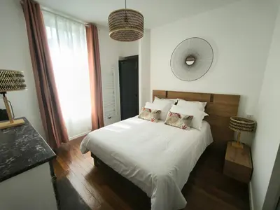 Un ou plusieurs lits dans un hébergement de l'établissement Gîte Champagne Philippe Moutardier - Chambre Arôme