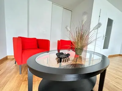 Coin salon dans l'établissement Terrasse & Bulles - Grand T3 au cœur de Reims
