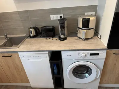 Cuisine ou kitchenette dans l'établissement Bienvenue au Quai 29