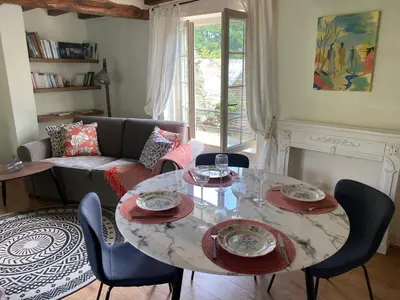 Coin salon dans l'établissement Maison des Roses