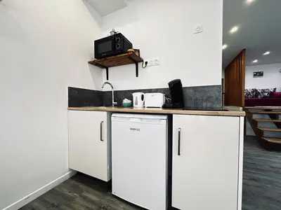 Cuisine ou kitchenette dans l'établissement La détente marocaine studio jacuzzi et terrasse