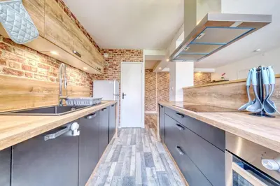Cuisine ou kitchenette dans l'établissement Le petit nid Rémois