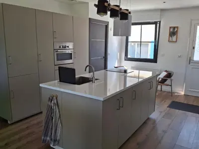 Cuisine ou kitchenette dans l'établissement La maison d'à côté Chambre 1