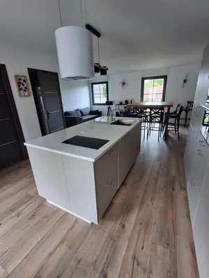 Cuisine ou kitchenette dans l'établissement la Maison d'à côté Chambre 3