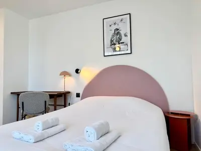 Un ou plusieurs lits dans un hébergement de l'établissement We Live Inn Sharies Reims A301