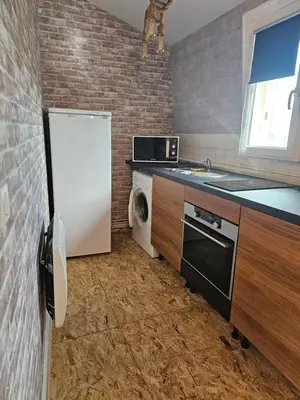 Cuisine ou kitchenette dans l'établissement T2 style industriel tout confort