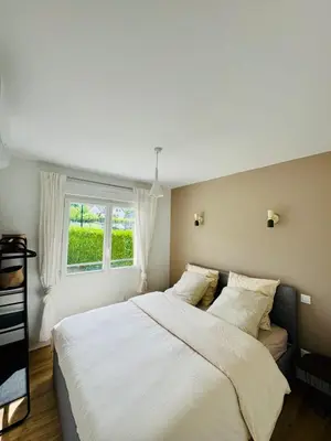 Un ou plusieurs lits dans un hébergement de l'établissement La maison de Lili