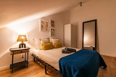 Un ou plusieurs lits dans un hébergement de l'établissement Maison du Barbâtre - 4 chambres chaleureuses