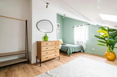 Un ou plusieurs lits dans un hébergement de l'établissement Maison du Barbâtre - 4 chambres chaleureuses