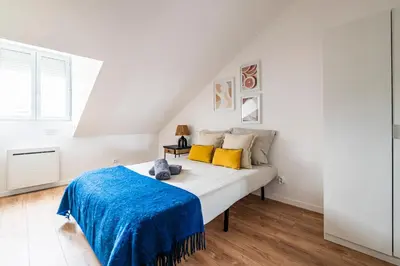 Un ou plusieurs lits dans un hébergement de l'établissement Maison du Barbâtre - 4 chambres chaleureuses