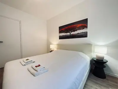 Un ou plusieurs lits dans un hébergement de l'établissement 1 Clairmarais T2 cosy a 2 pas du centre-ville
