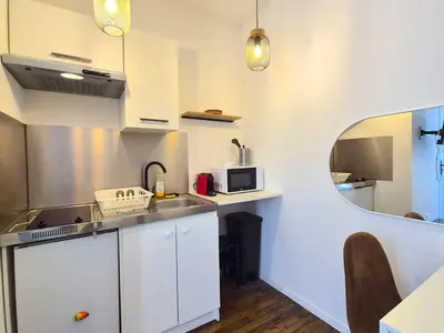 Cuisine ou kitchenette dans l'établissement Villeminot, 2 pers, Gare, Central, Agréable
