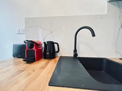 Cuisine ou kitchenette dans l'établissement 2 Clairmarais T2 en duplex proche gare centre