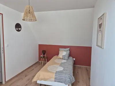 Un ou plusieurs lits dans un hébergement de l'établissement Maison de Claire