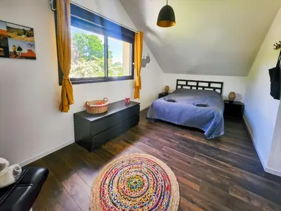 Un ou plusieurs lits dans un hébergement de l'établissement Loft Campagnard, Jardin, Terrasse