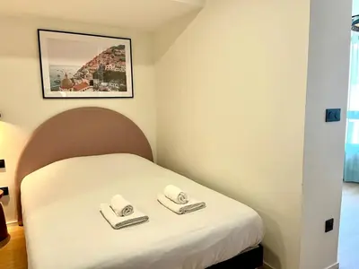 Un ou plusieurs lits dans un hébergement de l'établissement We Live Inn Sharies Reims - B502
