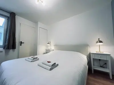 Un ou plusieurs lits dans un hébergement de l'établissement 4 clairmarais T2 chic et cocooning proche centre
